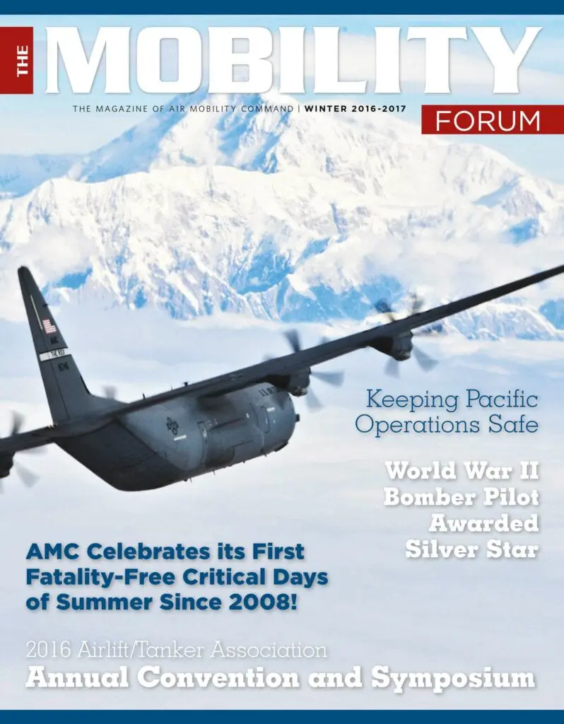 A magazine cover with an airplane flying over the mountains.