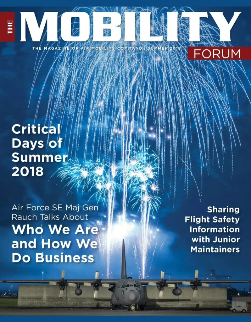A magazine cover with fireworks in the background.