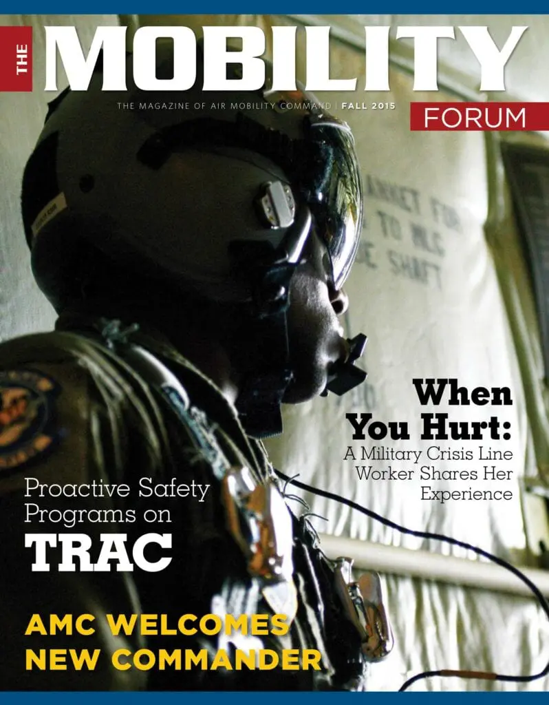 A man in military gear is standing on the cover of a magazine.