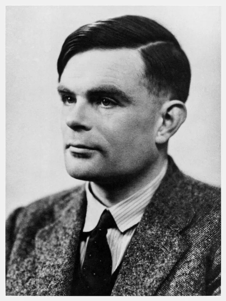 A black and white photo of alan turing