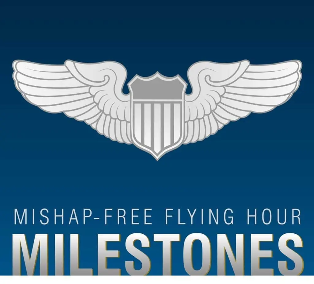 A silver wing with the words mishap-free flying hour milestones.