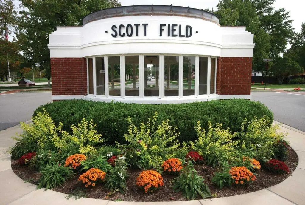 A building with flowers in front of it.