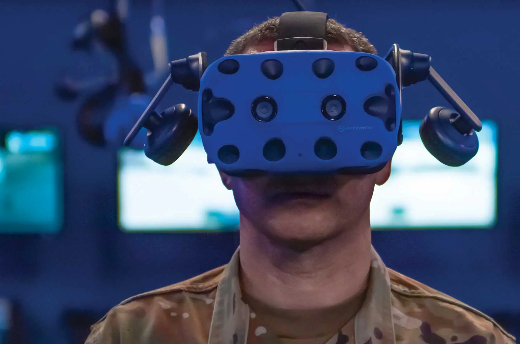 A soldier wearing a blue helmet and goggles.