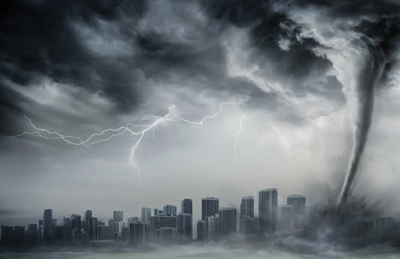 A city is covered by heavy clouds and lightning.