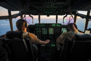 1 Lt Riley Richards and Capt Christopher Cruz operate a C-130J Super Hercules