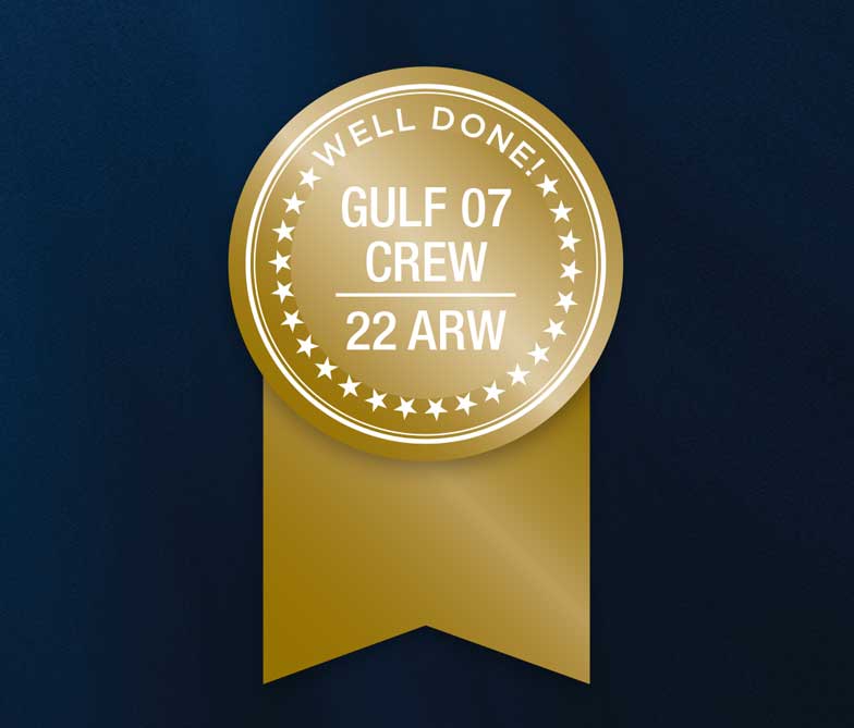A gold ribbon with the words " well done gulf 0 7 crew 2 2 arw ".