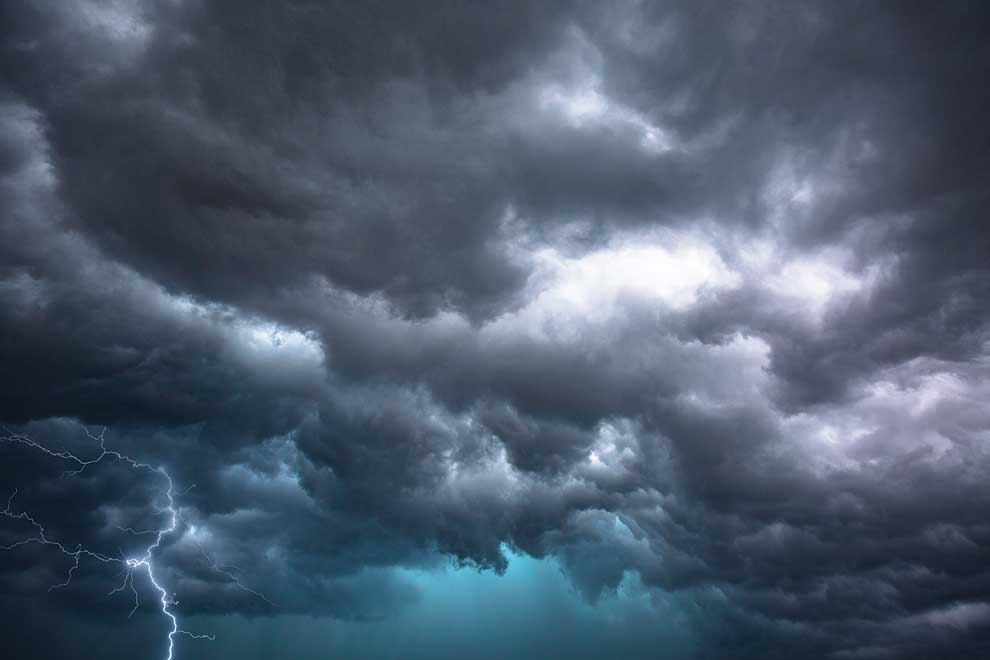 A storm is coming in the distance with dark clouds.