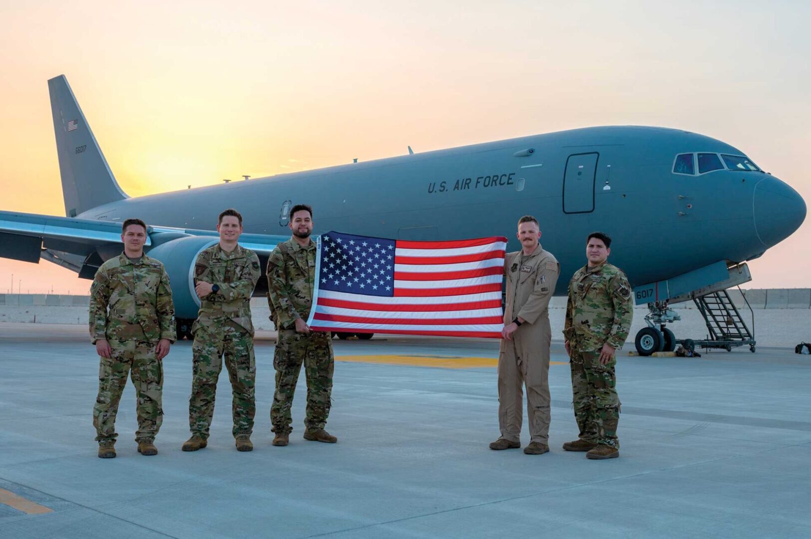 The aircrew from the KC-46A Pegasus’ first combat sortie pose for a group photo Aug. 29, 2022, during Air Mobility Command’s Employment Concept Exercise 22-08 at Al Udeid Air Base, Qatar. The Pegasus and aircrew participated in the exercise to provide air refueling operations to the U.S. Central Command theater. The team refueled two F-15E Strike Eagles assigned to the 335th Expeditionary Fighter Squadron. USAF photo by A1C Brenden Beezley