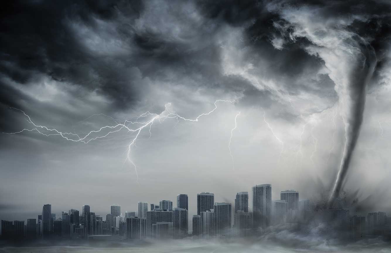 A city is covered by heavy clouds and lightning.