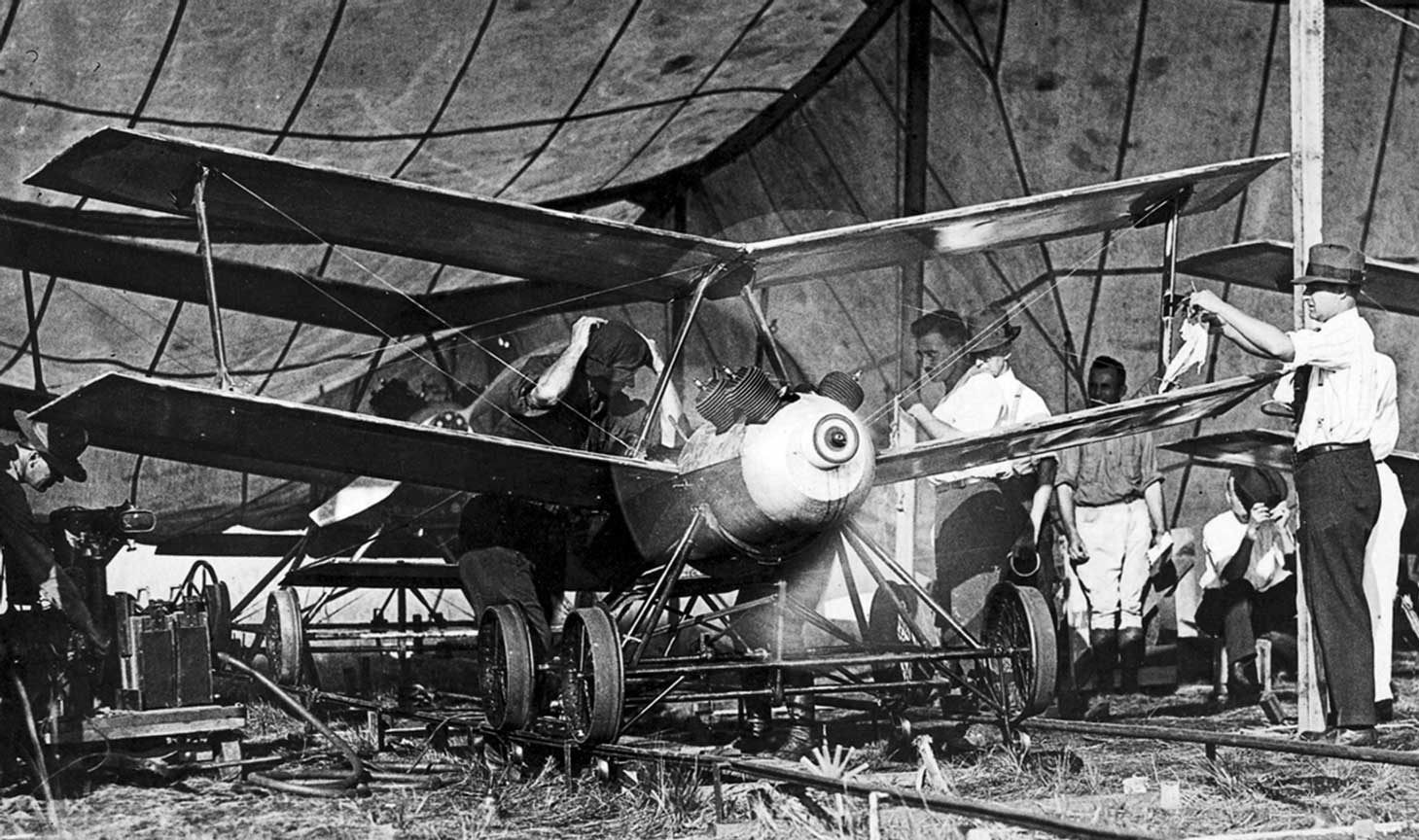 A black and white photo of an old airplane.