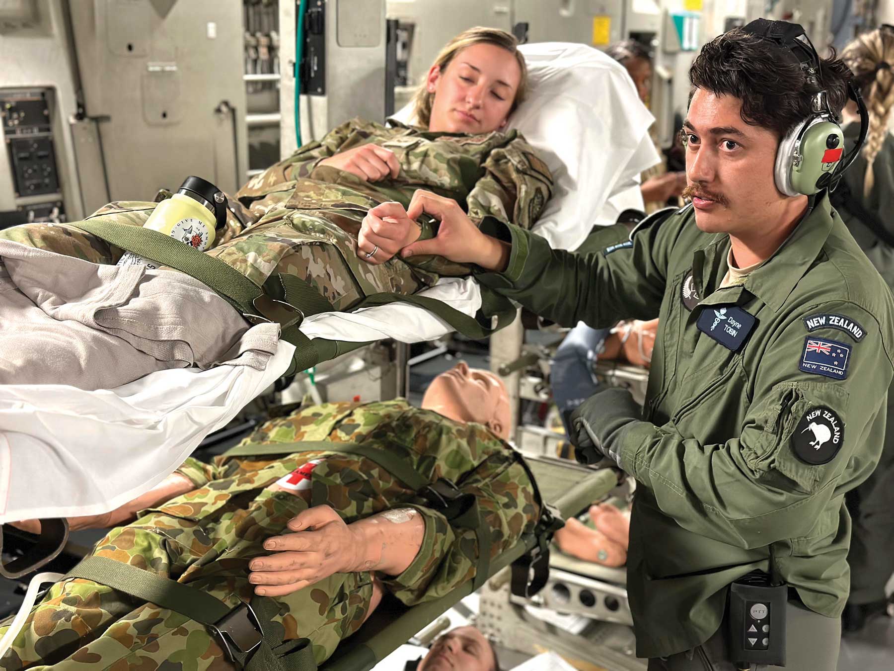 A soldier is sitting on the hospital bed