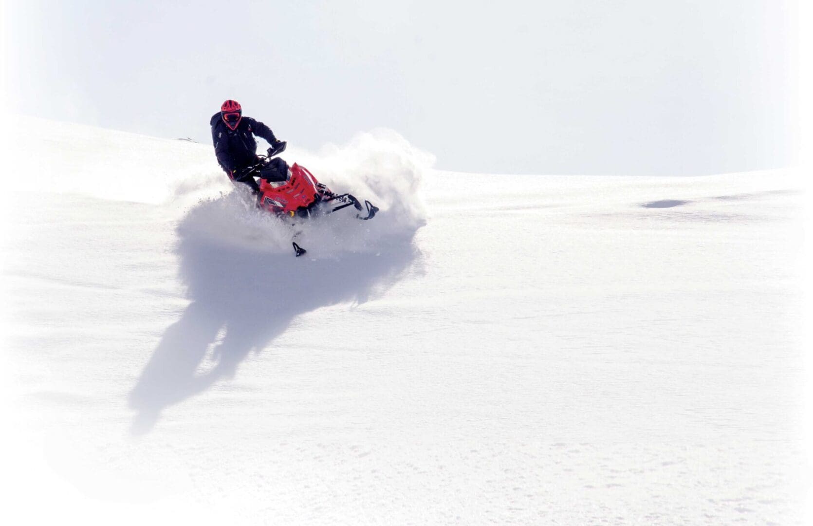 A person on a snow board in the air