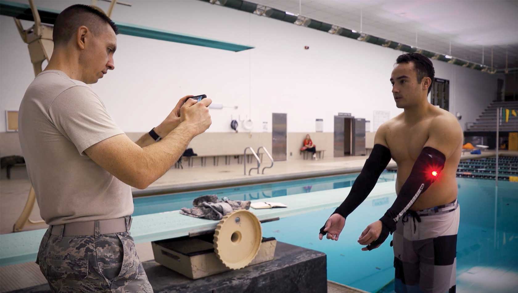 Screenshot of a video of Air Force Research Laboratory engineers testing the Flashing Indicator of Swimmer’s Health (FISH) system at Wright State University, Dayton, OH, Nov. 27, 2019. FISH is a personal underwater blood-oxygen monitor that detects potential blackout conditions and alerts users.