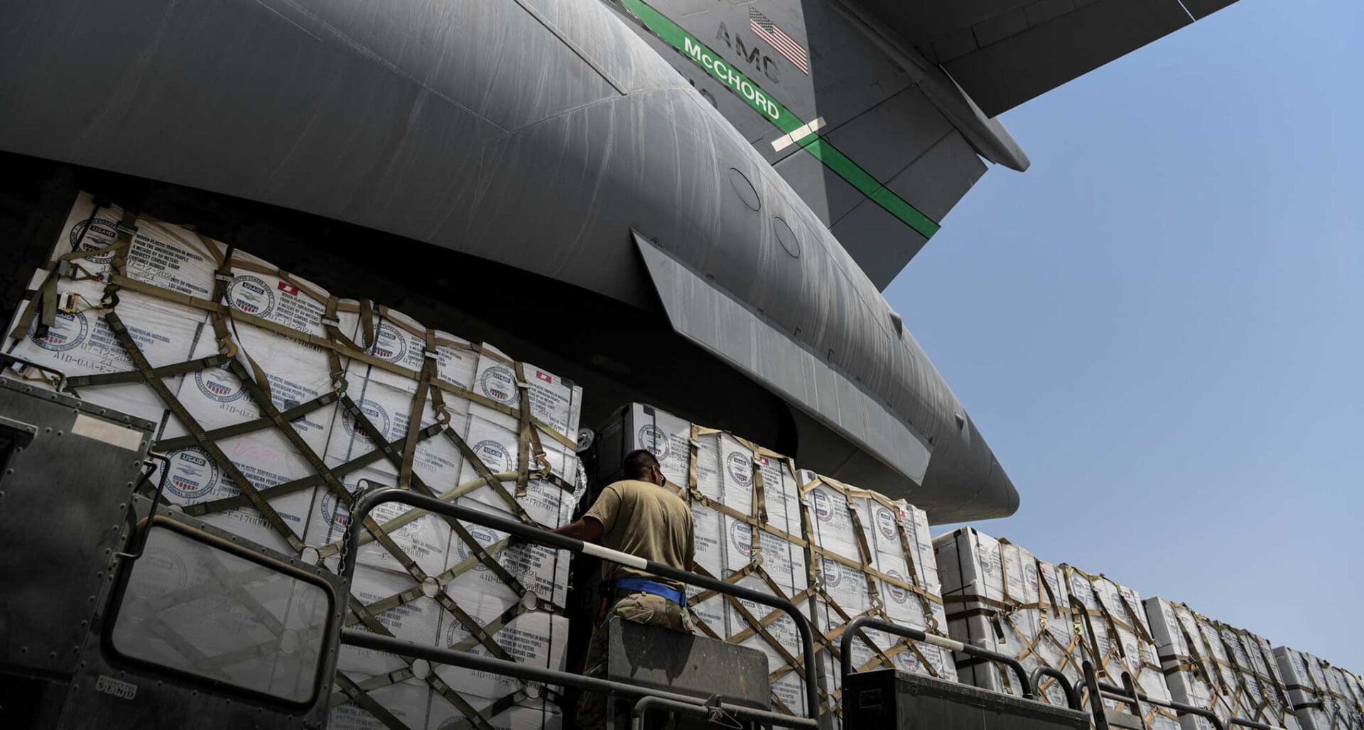 Flood relief items bound for Pakistan are loaded onto a C-17 Globemaster assigned to the 379th Air Expeditionary Wing, September 9, 2022 at Al Dhafra Air Base, United Arab Emirates. The 380th Expeditionary Logistics Readiness Squadron worked hand in hand with Airmen from the 816th Expeditionary Airlift Squadron to load more than 90,000 pounds of humanitarian aid bound for Pakistan. USAF photo by TSgt Jeffrey Grossi