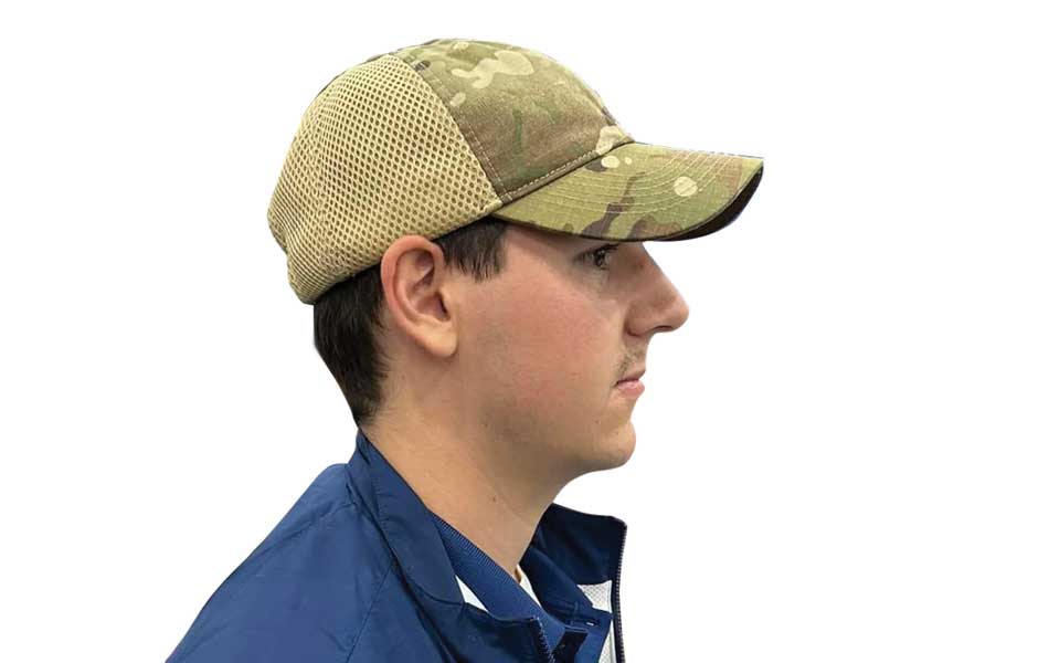 A member of the 436th Airlift Wing showcases the newly designed unisex bump cap at the Airlift/Tanker Association Conference in Grapevine, TX, Nov. 9, 2023. USAF photo by SSgt Sheila Moody