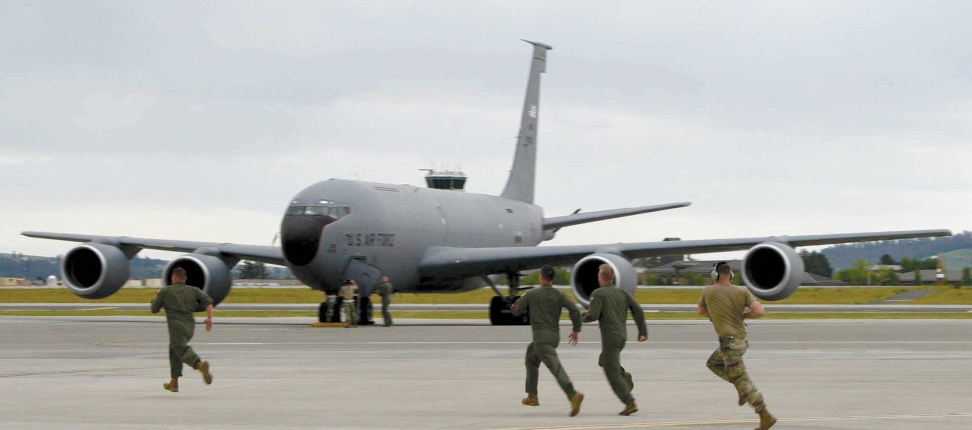 Airmen from the 141st Air Refueling Wing run to a KC-135 Stratotanker during a simulated alert response at Fairchild Air Force Base, WA, June 1, 2024. USANG photo by SrA Anneliese Kaiser