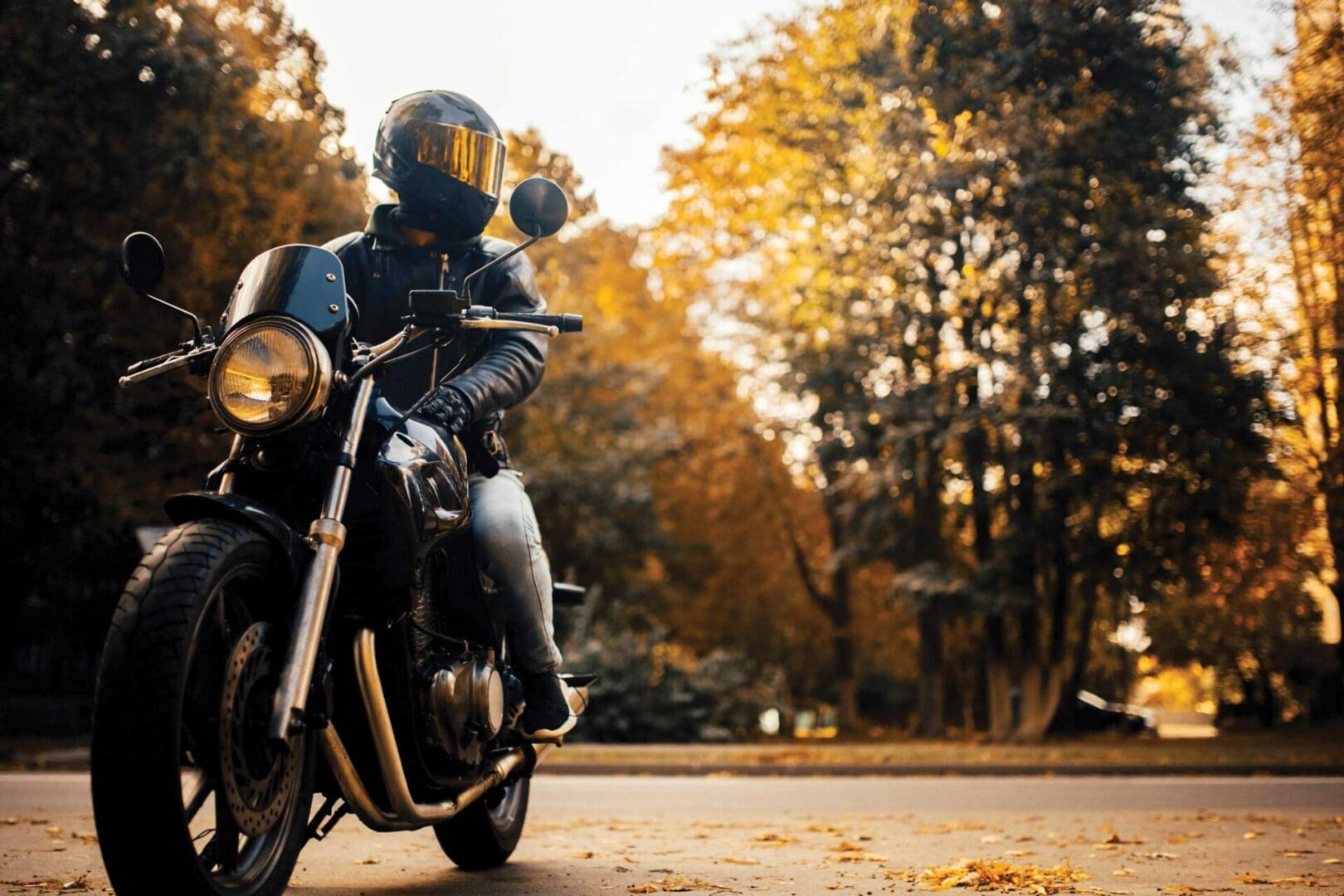 A rider wearing protective gear on a motorcycle.