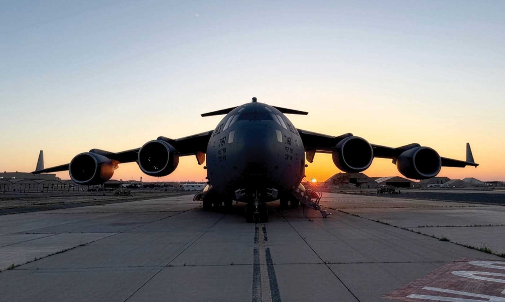 A C-17 Globemaster III aircraft sits on the flightline at an undisclosed location.