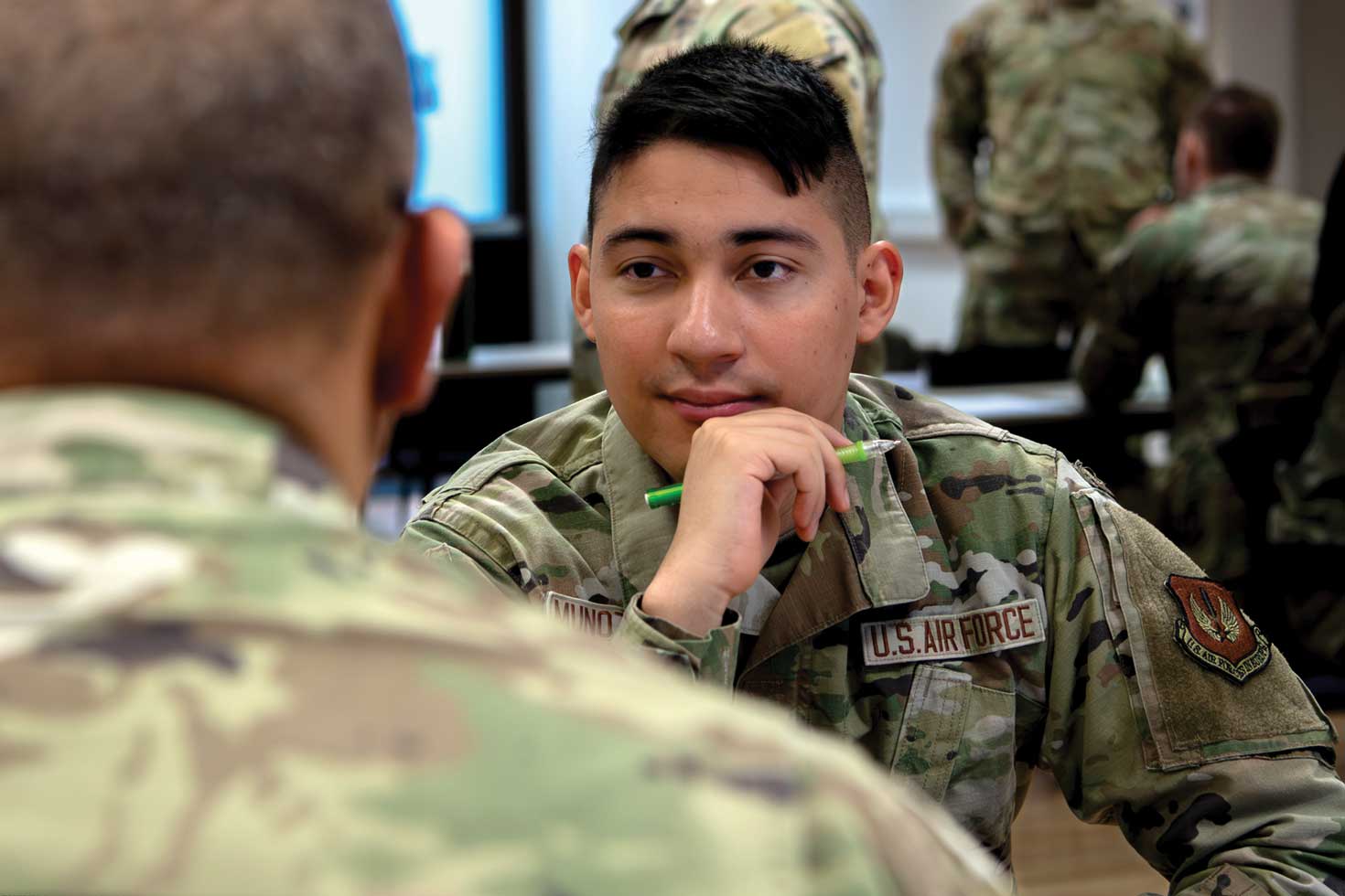 SrA Oscar Munoz-Saenz receives mentoring from SMSgt. Billy Diaz.
