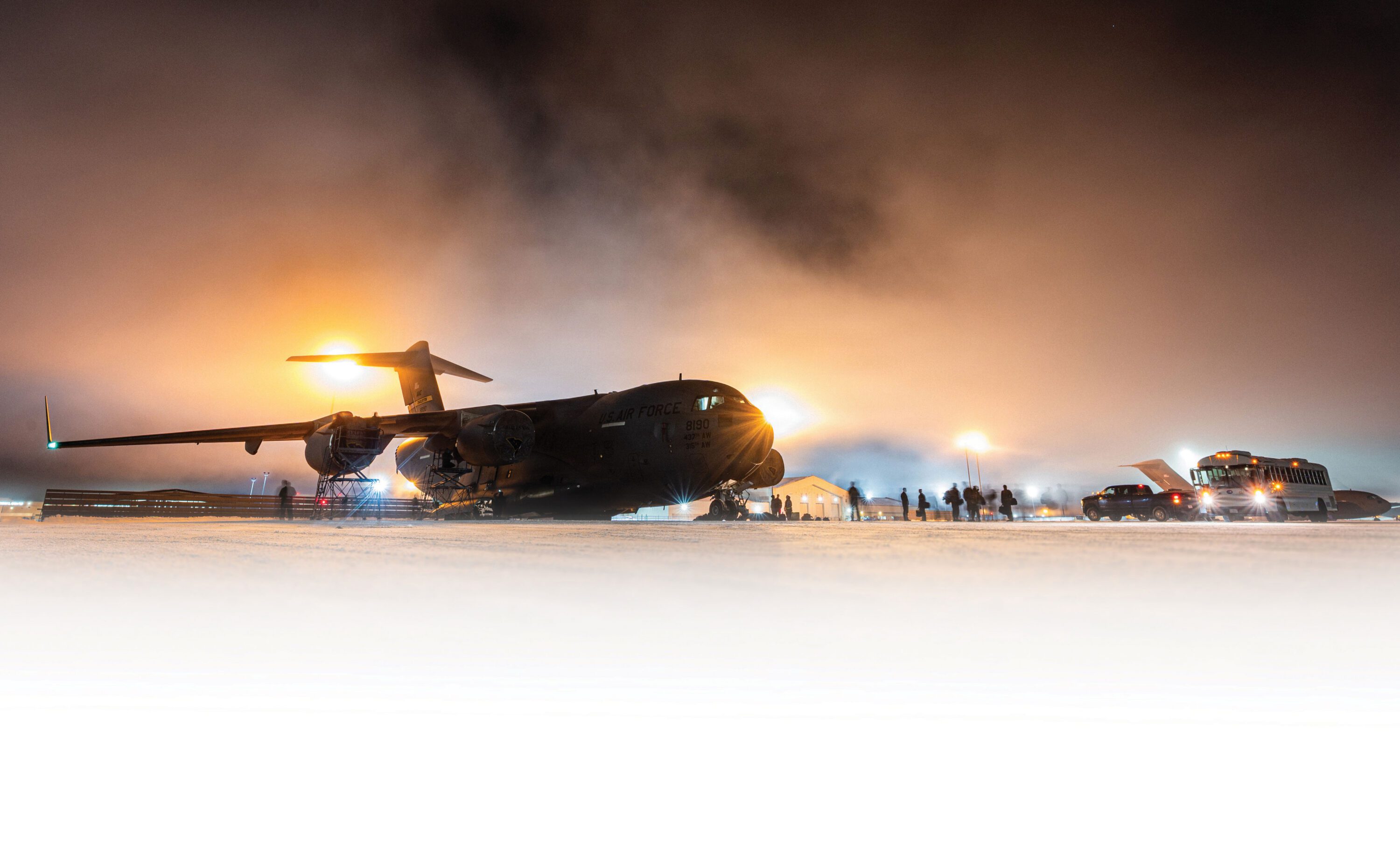 Airmen assigned to the 437th Aircraft Maintenance Squadron attach engine covers to a C-17 Globemaster III during a post-flight inspection at Joint Base Elmendorf-Richardson, AK.