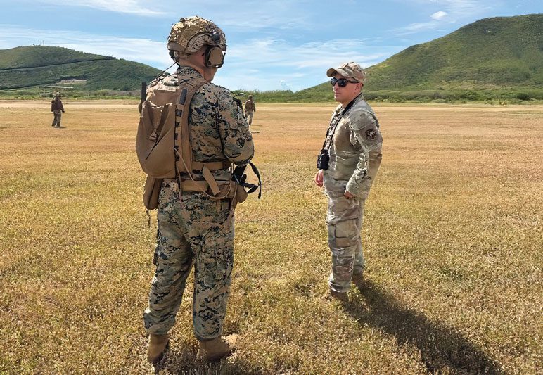 1 Lt Brady Williams, 22d Marine Expeditionary Unit Marine Mobile Air Traffic Control Team Officer in Charge, and Capt Juan Niño, 621st Contingency Response Group Landing Zone Survey Team Lead.