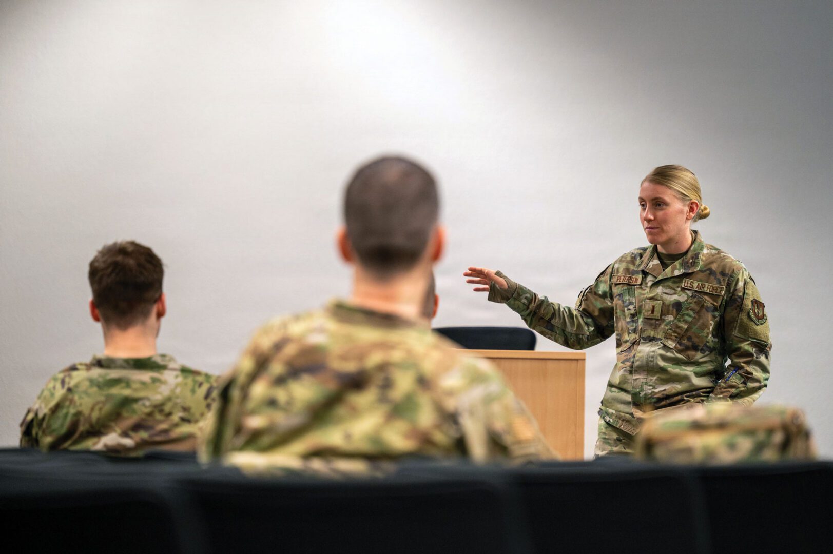 2 Lt Allyson Peterson, 86th Operational Medical Readiness Squadron Bioenvironmental Flight Officer in Charge, briefs her proposed decontamination and response procedures to the participants of exercise Radiant Falcon at Ramstein Air Base, Germany.