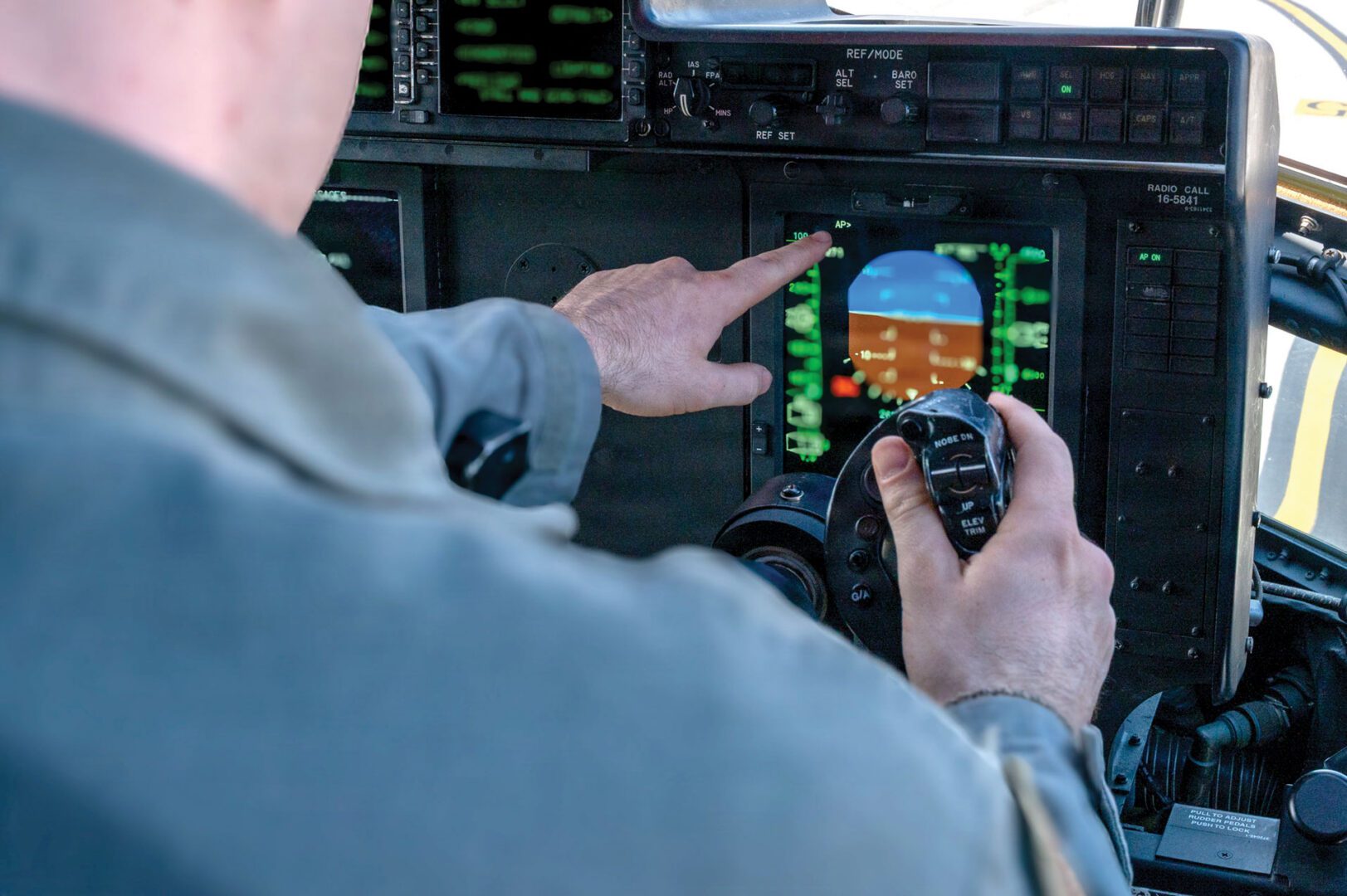 SrA Benjamin Spencer, 374th Aircraft Maintenance Squadron Avionics Journeyman, troubleshoots the autopilot on a C-130J Super Hercules at Yokota Air Base, Japan.